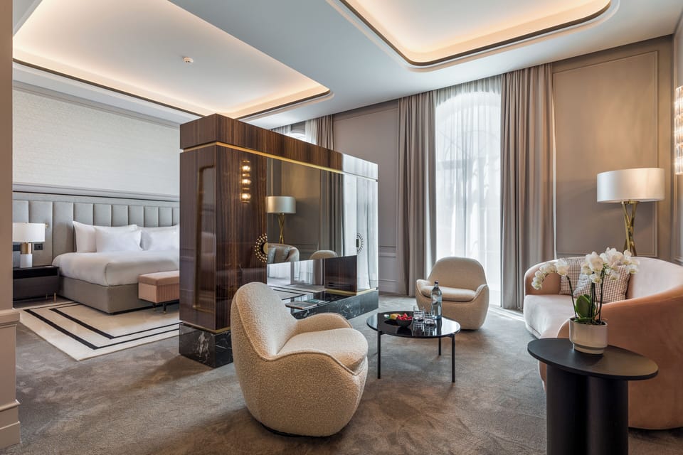 Suite | Living area | 53-cm flat-screen TV with satellite channels, iPod dock