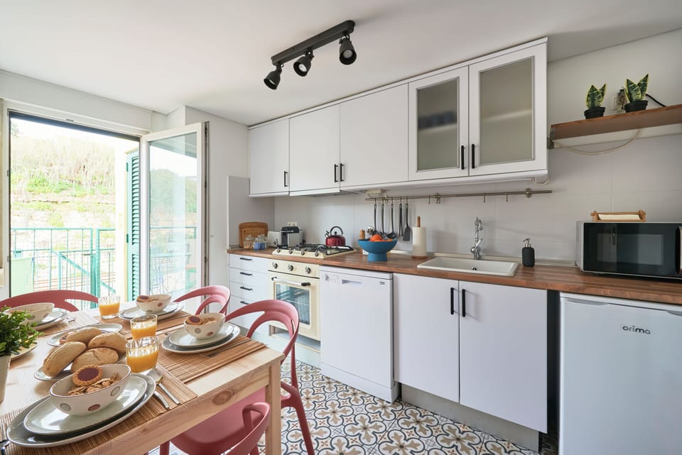 Apartment, 2 Bedrooms | Private kitchen | Fridge, microwave, oven, stovetop