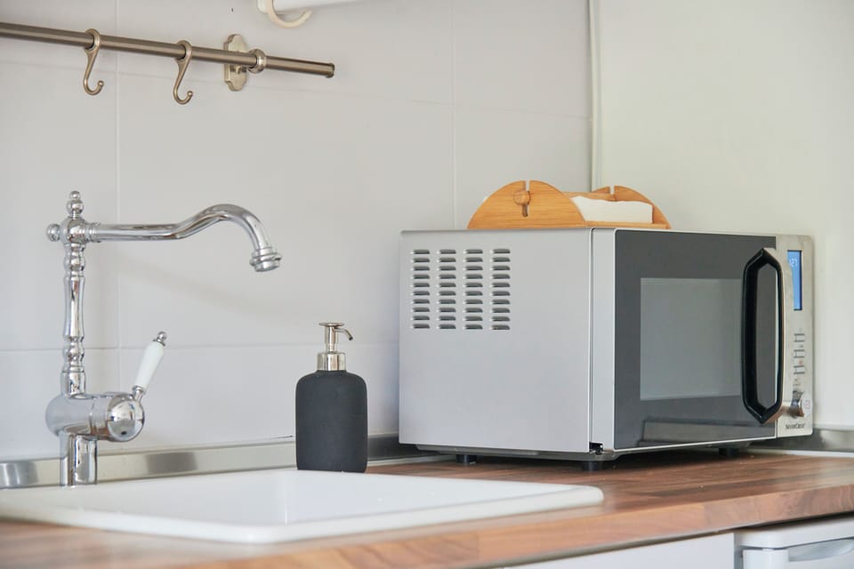 Apartment, 2 Bedrooms | Private kitchen | Fridge, microwave, oven, stovetop
