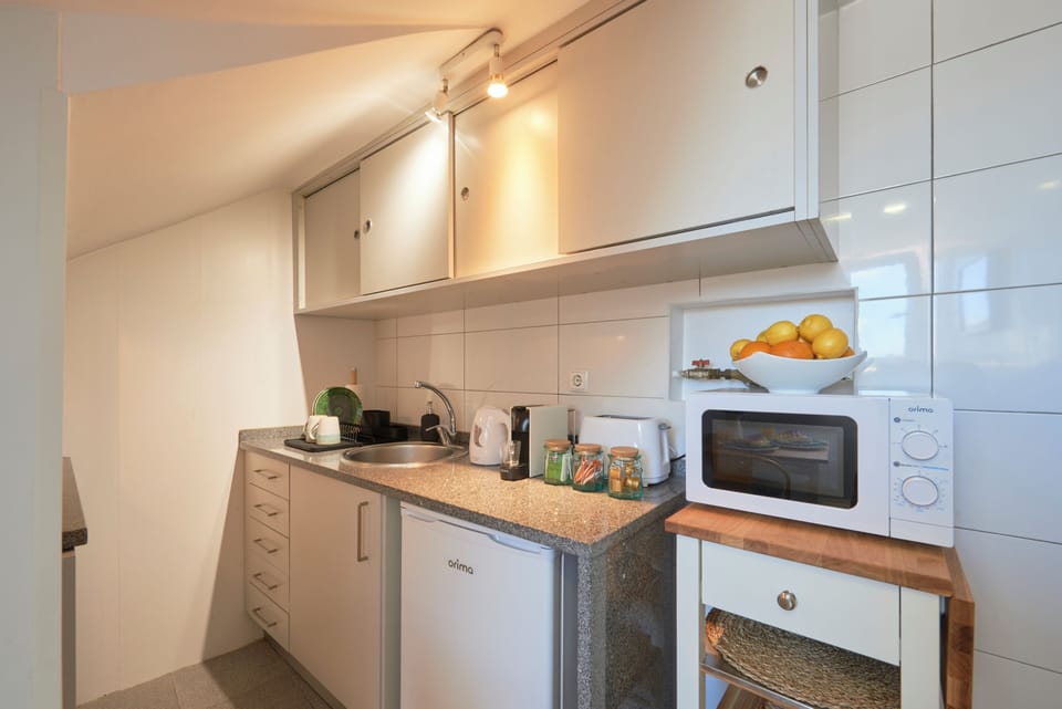 Apartment | Private kitchen | Fridge, microwave, stovetop, espresso maker