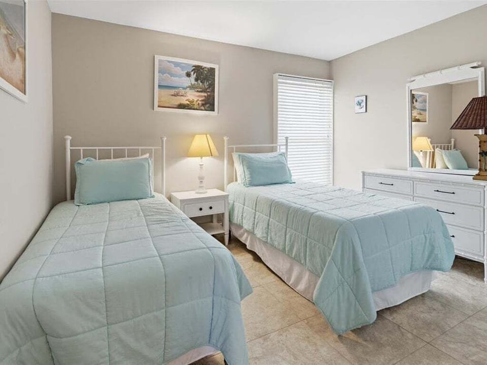 guest bedroom with twin beds