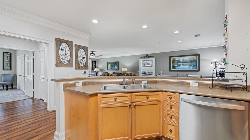 The kitchen space is open, yet is fully stocked for your culinary needs.
