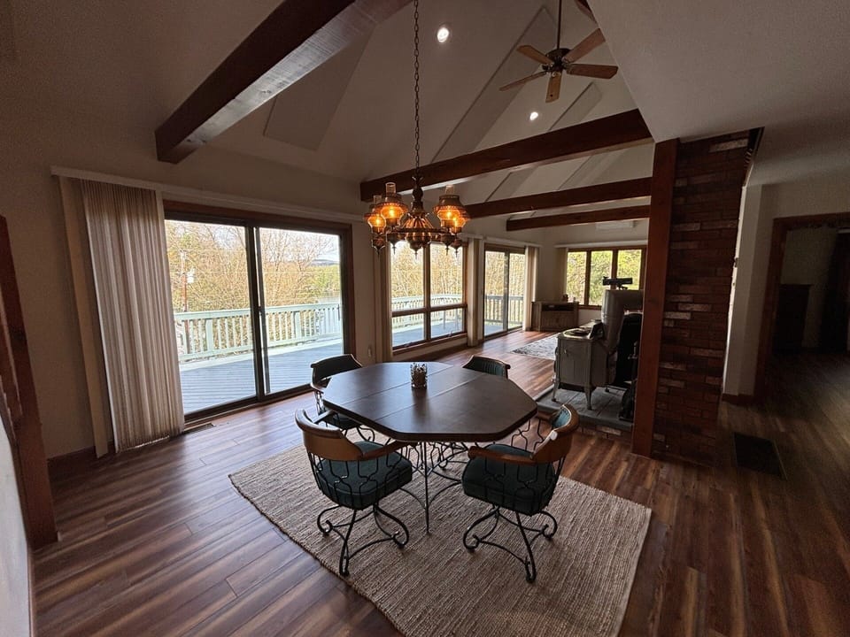 Formal Dining with Large windows and sliders to enjoy the views