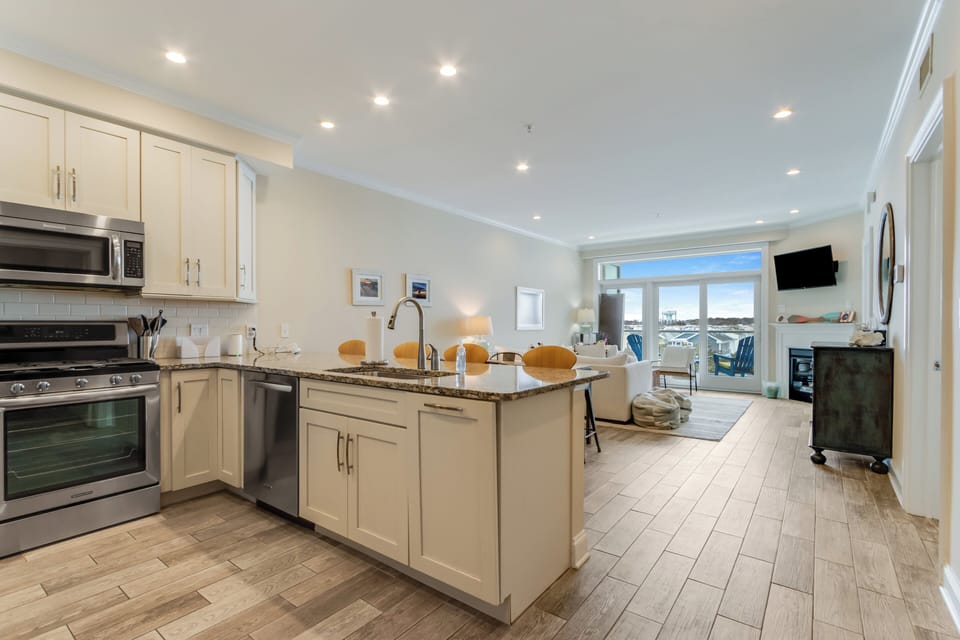 View of open floor plan looking toward the outside balcony