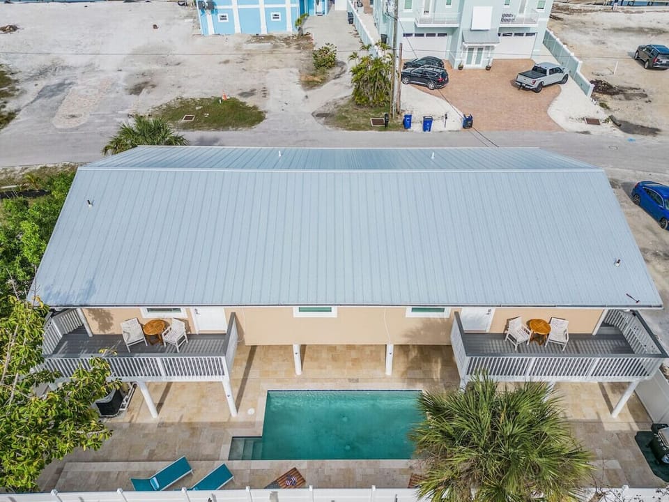 Both vacation apartments are upstairs, accessed by stairs on either side. Each has its own balcony and is completely self-contained, Your vacation apartment is the one shown here on the right (on the left when looking from the front of the building).