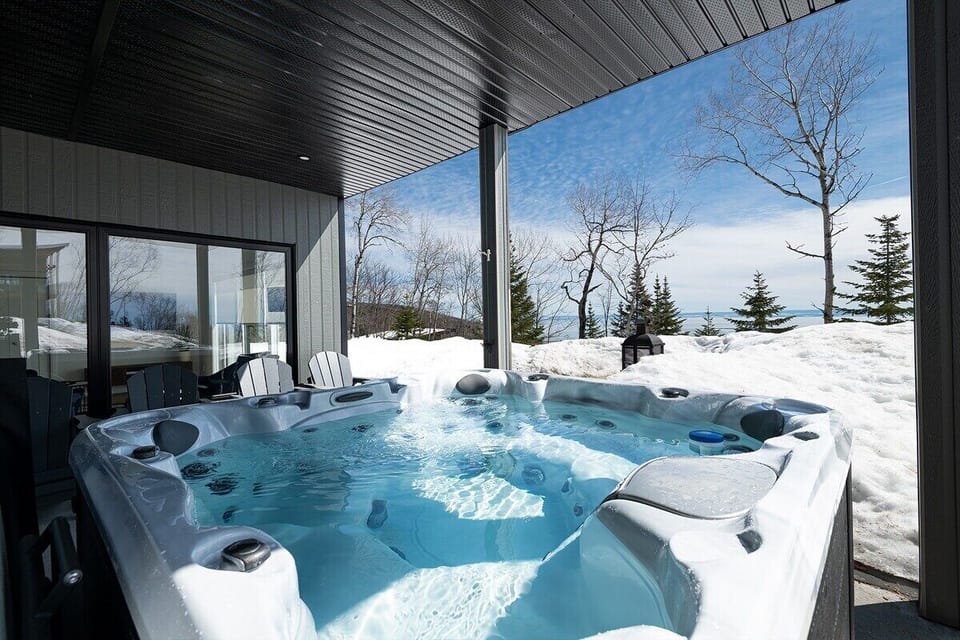 Relax in the hot tub with stunning views.