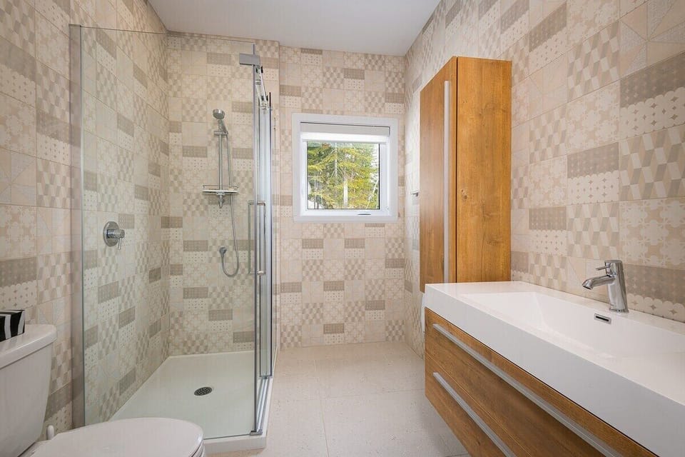 Refresh in style with a shower and view to match.