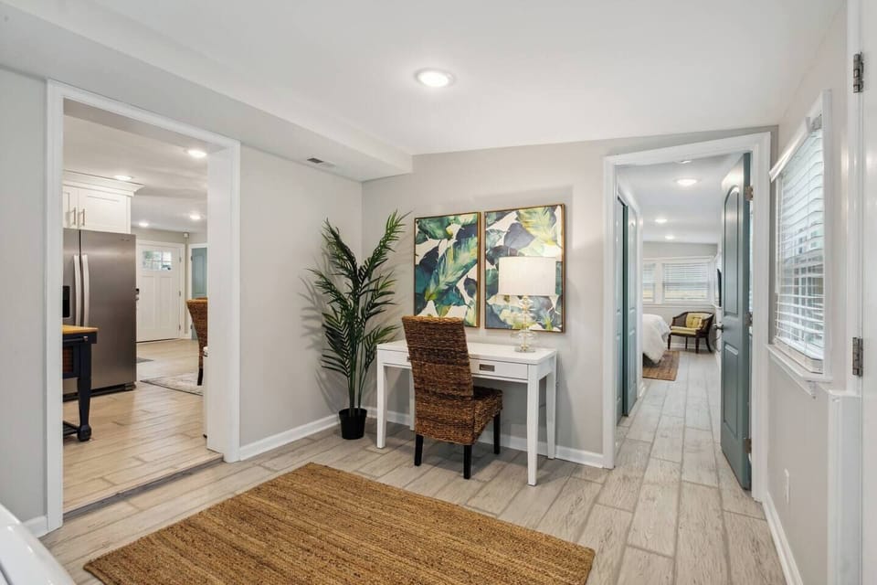 This well-lit haven boasts ample natural light and a stylish lamp on the desk to create the perfect environment for focused productivity.  The comfortable chair encourages good posture, while the spacious desk provides ample room for all your study essentials.  This inspiring space is designed to help you achieve your academic goals.