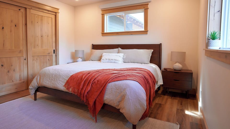 Master bedroom with king bed and large reach in closet.