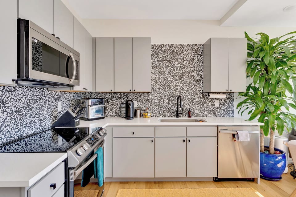 Kitchen on 2nd floor with Nespresso machine and pods