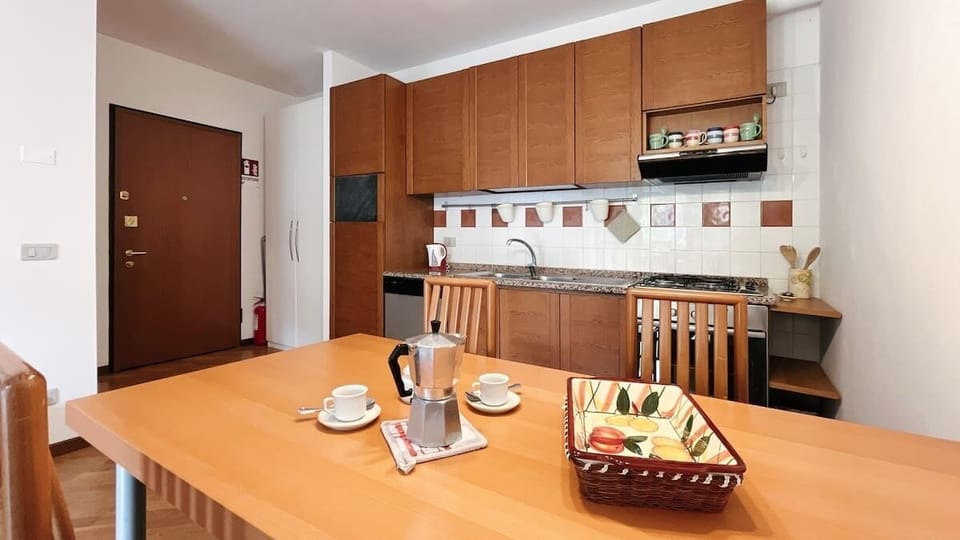 Kitchen equipped with table for dining