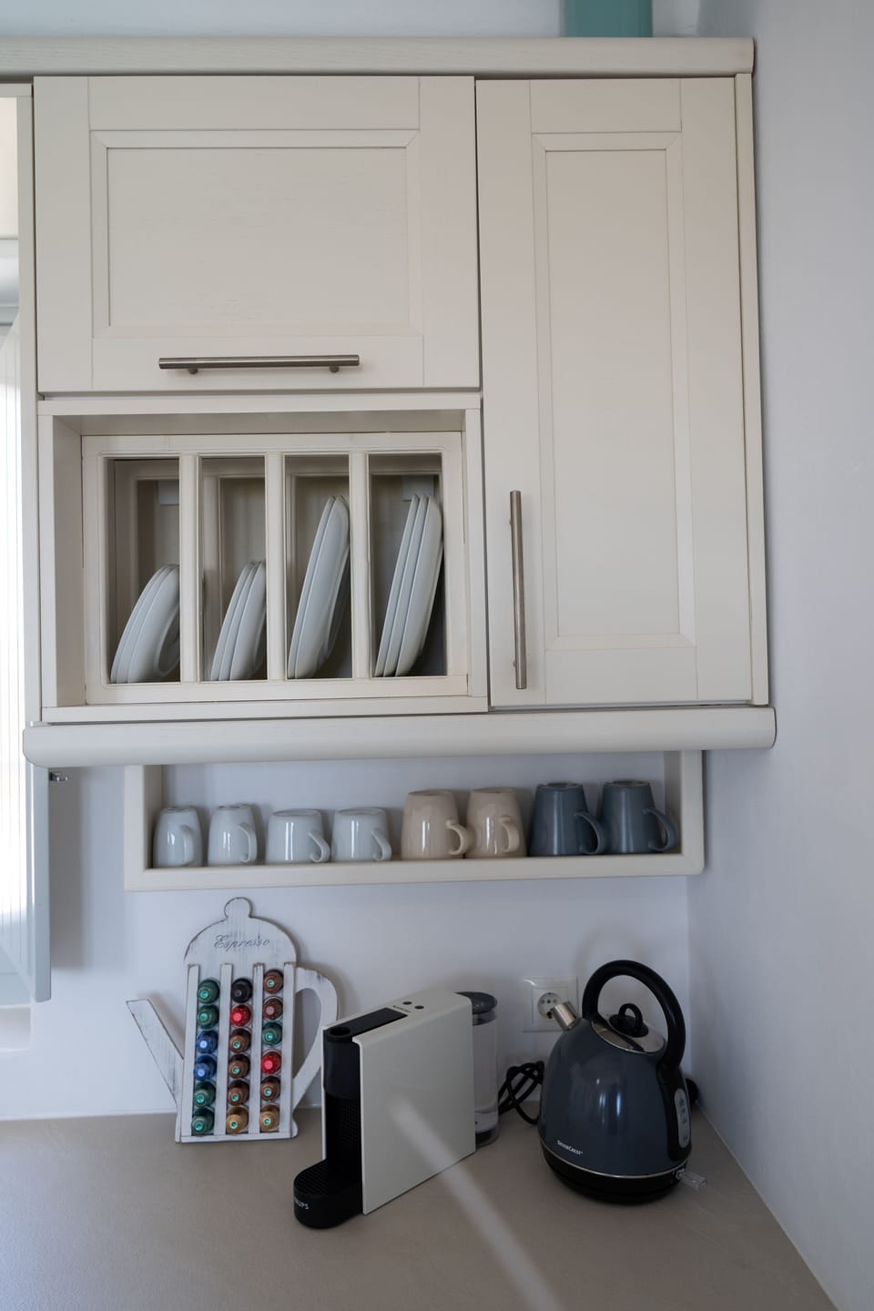 Deluxe Suite | Private kitchen | Espresso maker, mini-fridge, electric kettle, highchair