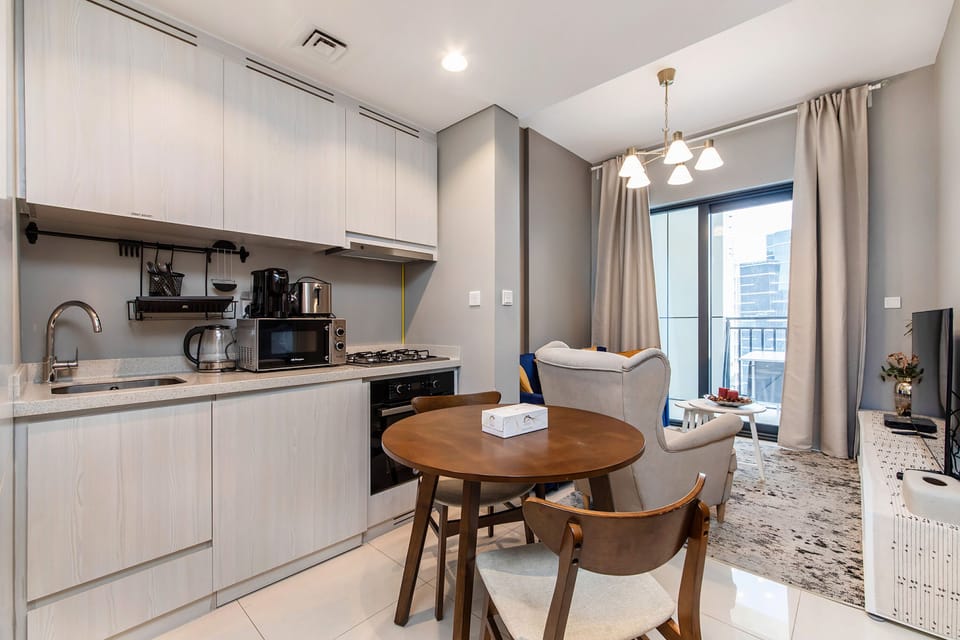 Premium Apartment, 1 Bedroom, Balcony, Canal View | Living area | 50-inch Smart TV with digital channels