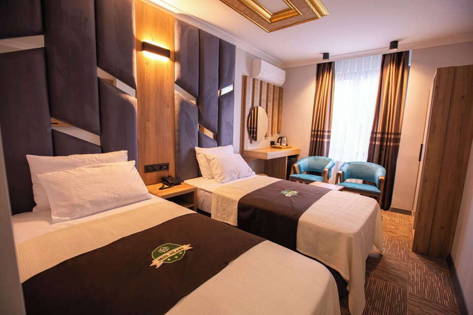 Premium Double or Twin Room, Partial Sea View | In-room safe, laptop workspace, soundproofing, free WiFi
