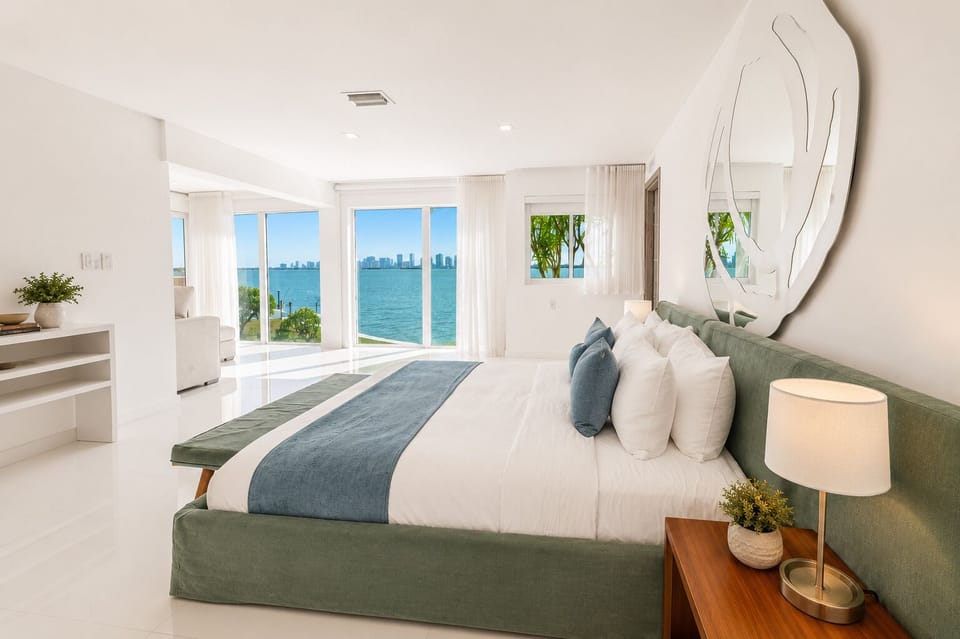 Bright waterfront king suite with stunning views and airy modern style