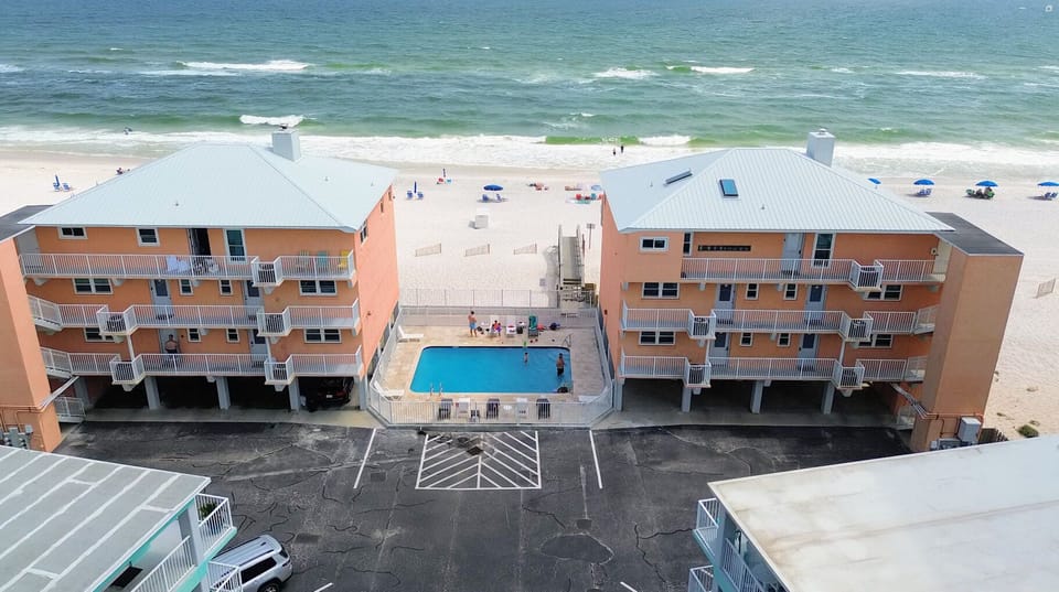 Take pleasure in swimming in the heated pool by the beach as you unwind to the soothing sound of the waves breaking on the shore.