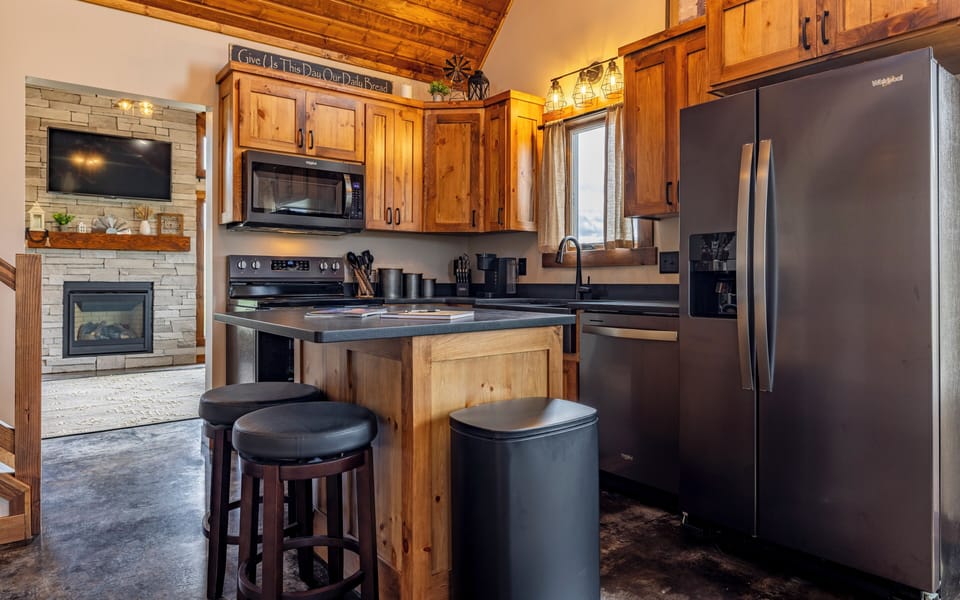 Kitchen with modern appliances is stocked to make meal preperation a pleasure.