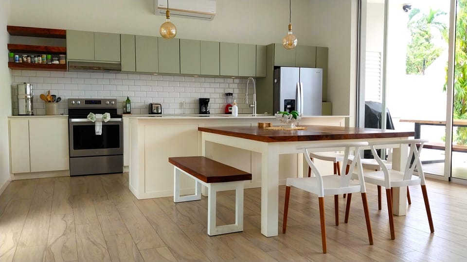 Comfortable modern dining space, conveniently attached to the bright kitchen