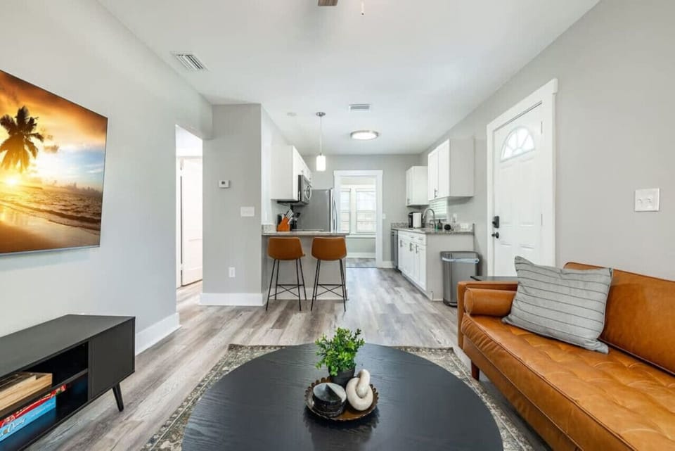 Enjoy your morning coffee at the bar or cook up a meal in the fully equipped kitchen just steps away.