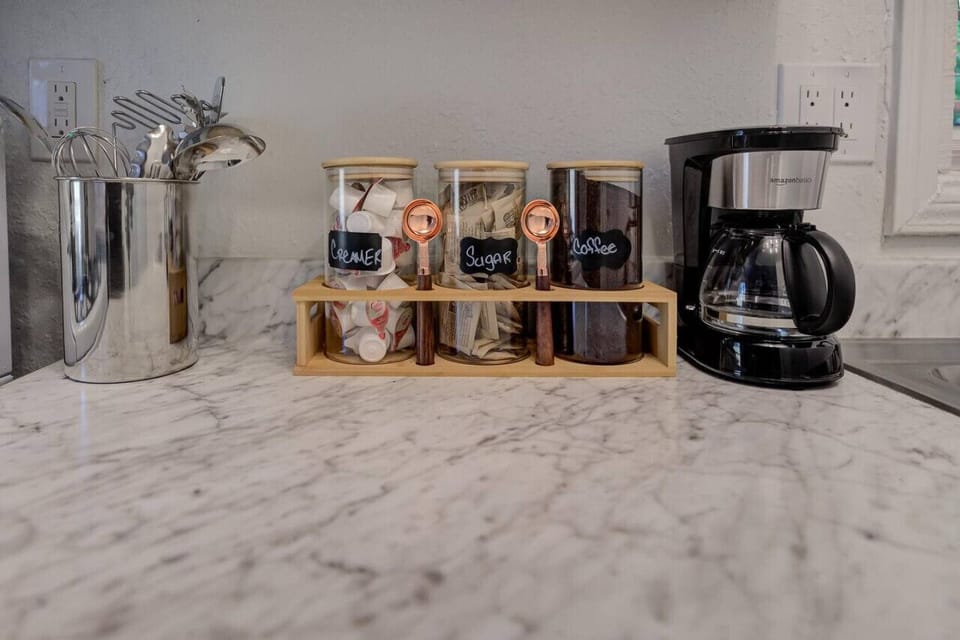 Wake up to fresh coffee each morning with our thoughtfully stocked coffee station. All the comforts of home await in this charming kitchenette.