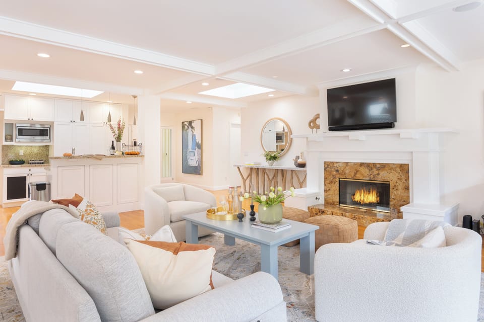 Enjoy movie nights and cozy fireside chats in our inviting living room.