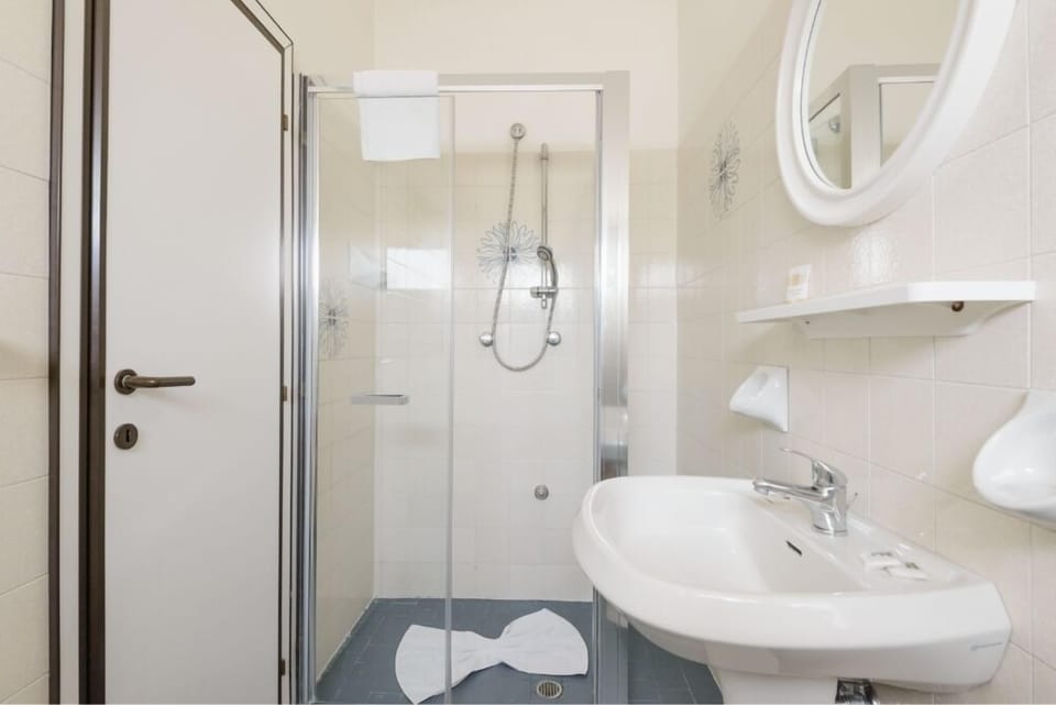 Quadruple Room, Air conditioning | Bathroom | Shower, hair dryer, towels, soap