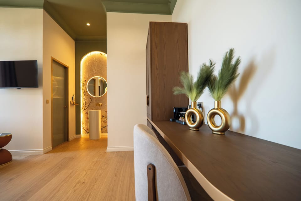 Junior Suite, Balcony, Sea View | Premium bedding, in-room safe, desk, laptop workspace