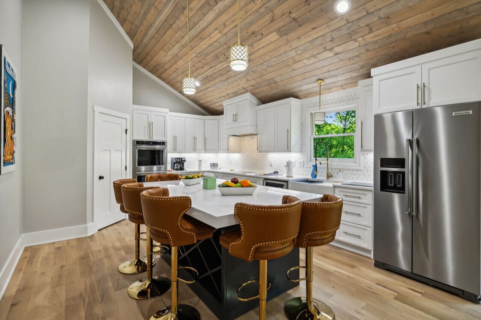 Full kitchen with all cooking essentials and island for additional seating (This is one of two kitchens in the home!)