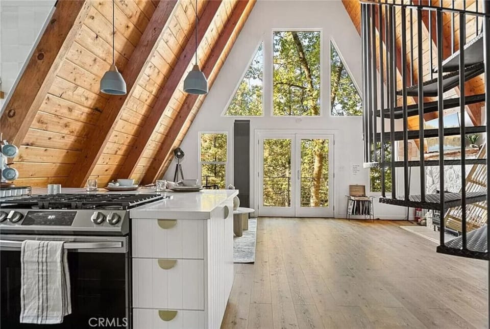 Spacious Kitchen: Craft culinary delights with stunning views and airy vaulted ceilings!