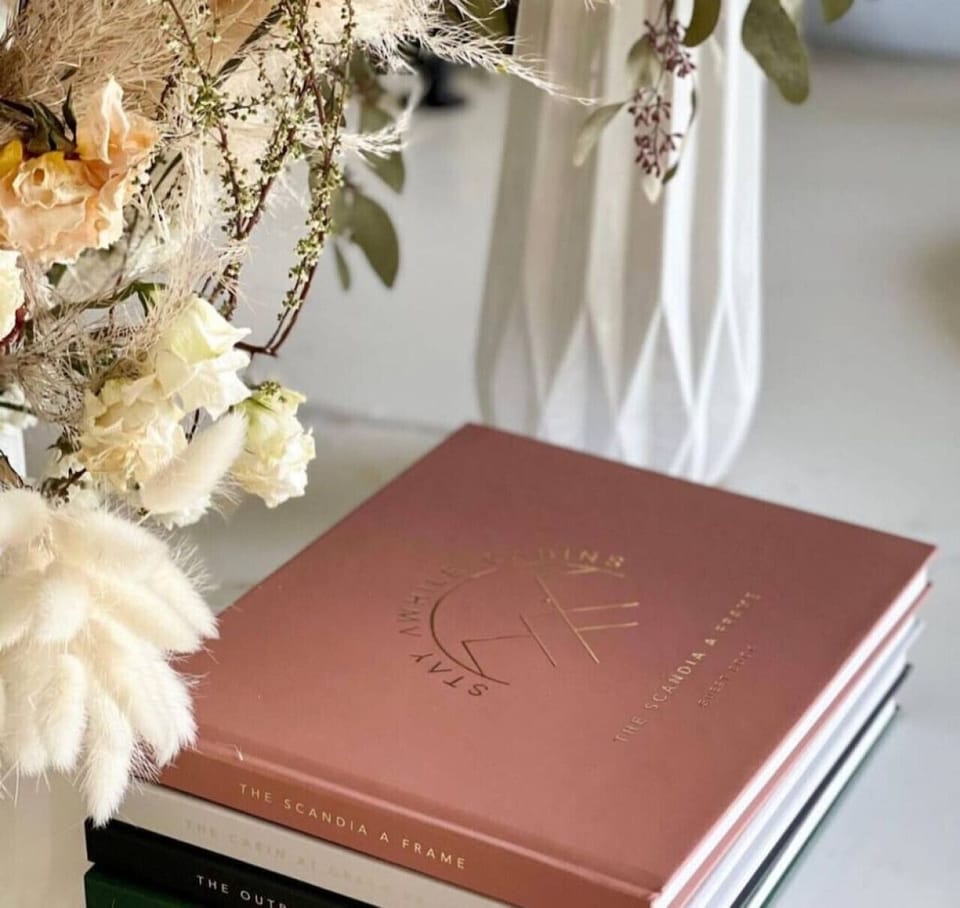 Charming Nook: Delight in nature-inspired decor & explore our guestbook for local adventures!