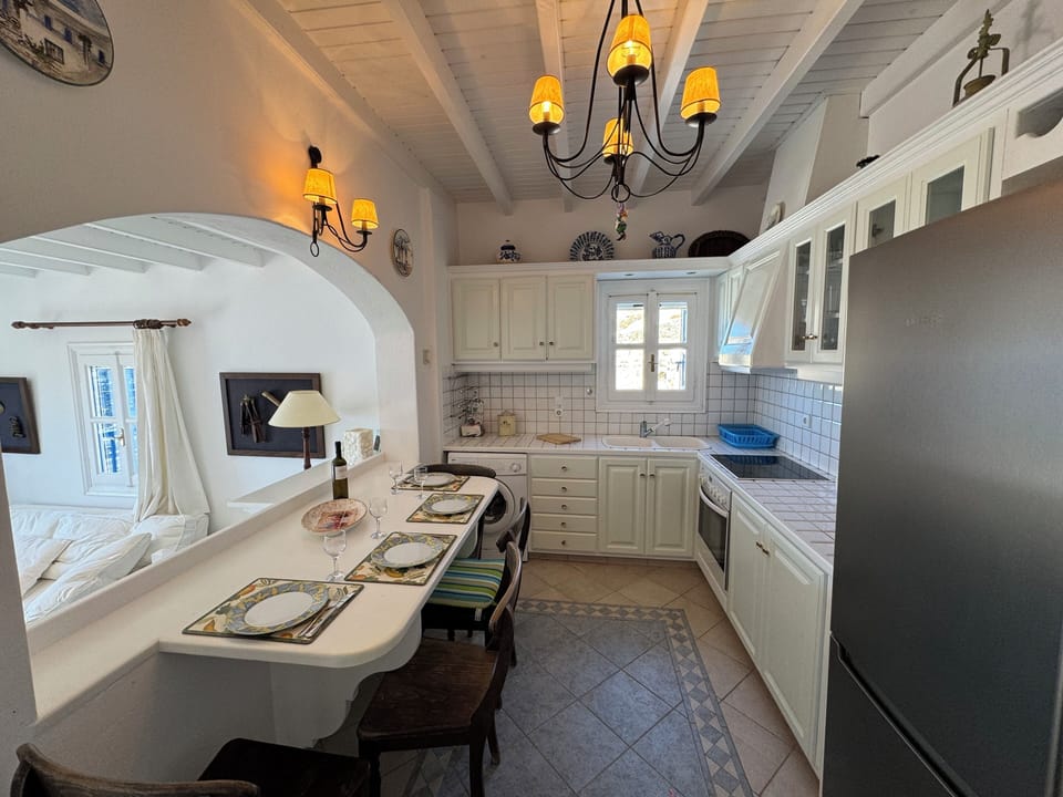 Full-size fridge, oven, electric kettle, toaster