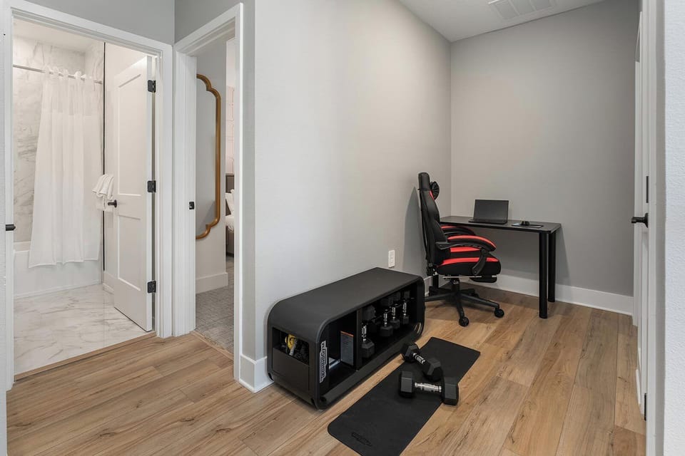 Game Loft w/ Workout Equipment and Office Desk
