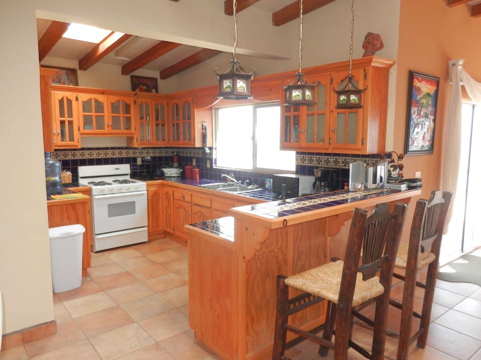 lovely full kitchen with ocean views
