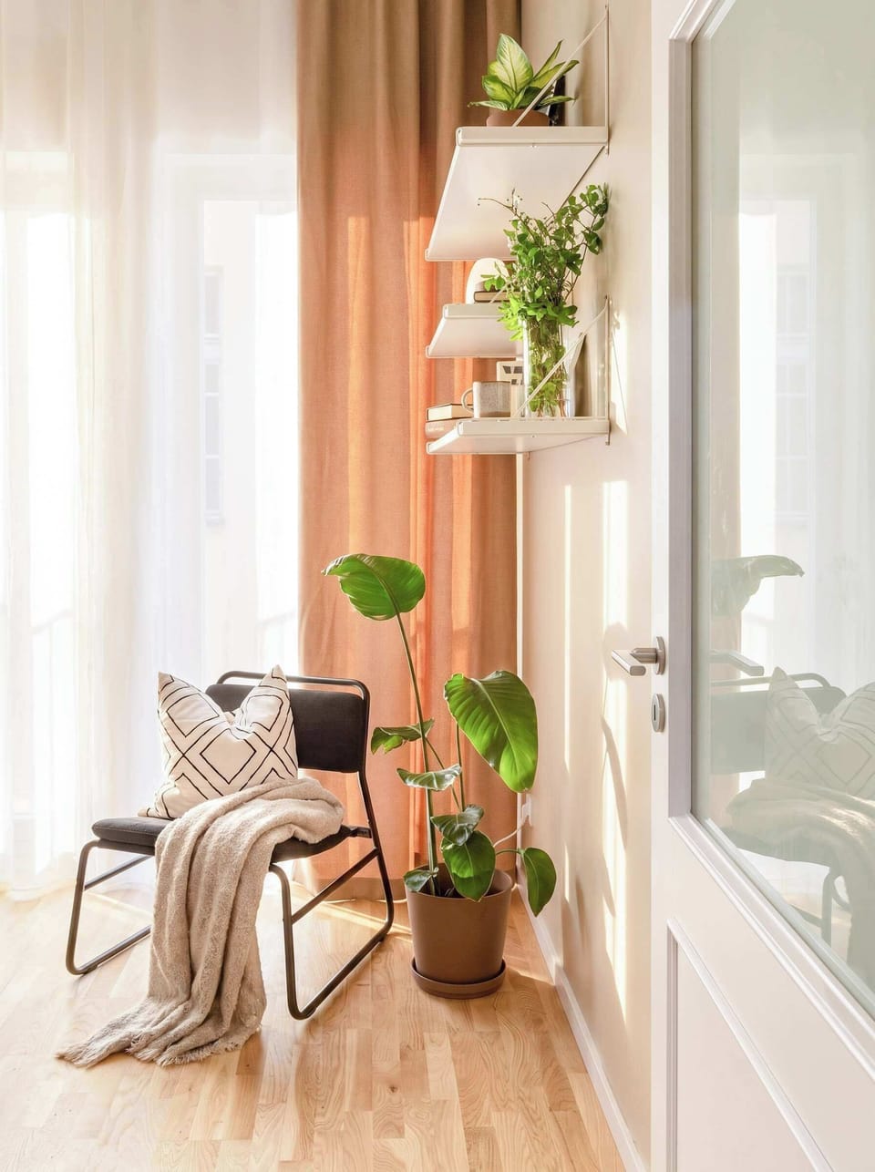 In the living room there is a cozy seating area