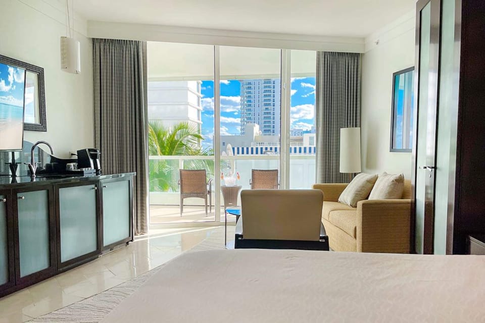 Junior Studio, Non Smoking, City View | Living area | Flat-screen TV