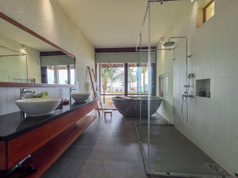 Luxury Sea Front Villa Double | Bathroom | Separate tub and shower, deep soaking tub, rainfall showerhead