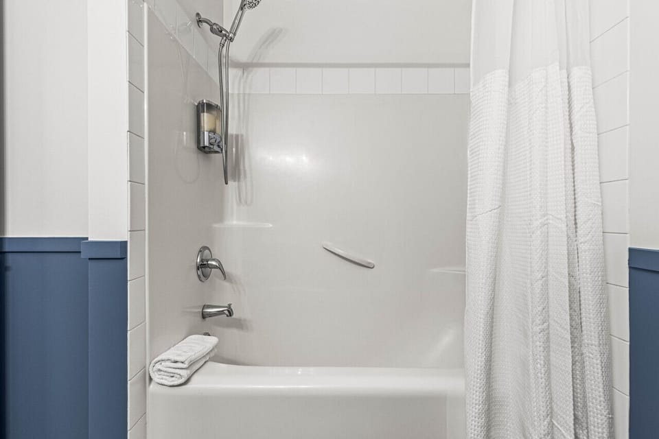 Master Ensuite with shower over bath
