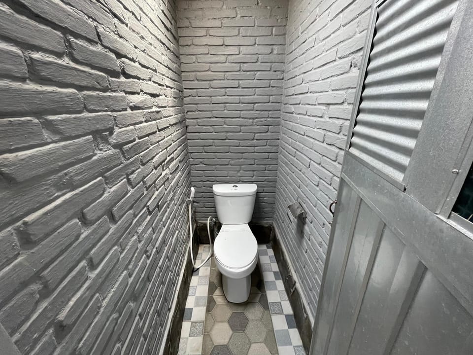 Economy Bungalow, Non Smoking, Balcony | Bathroom | Shower, towels, soap, shampoo