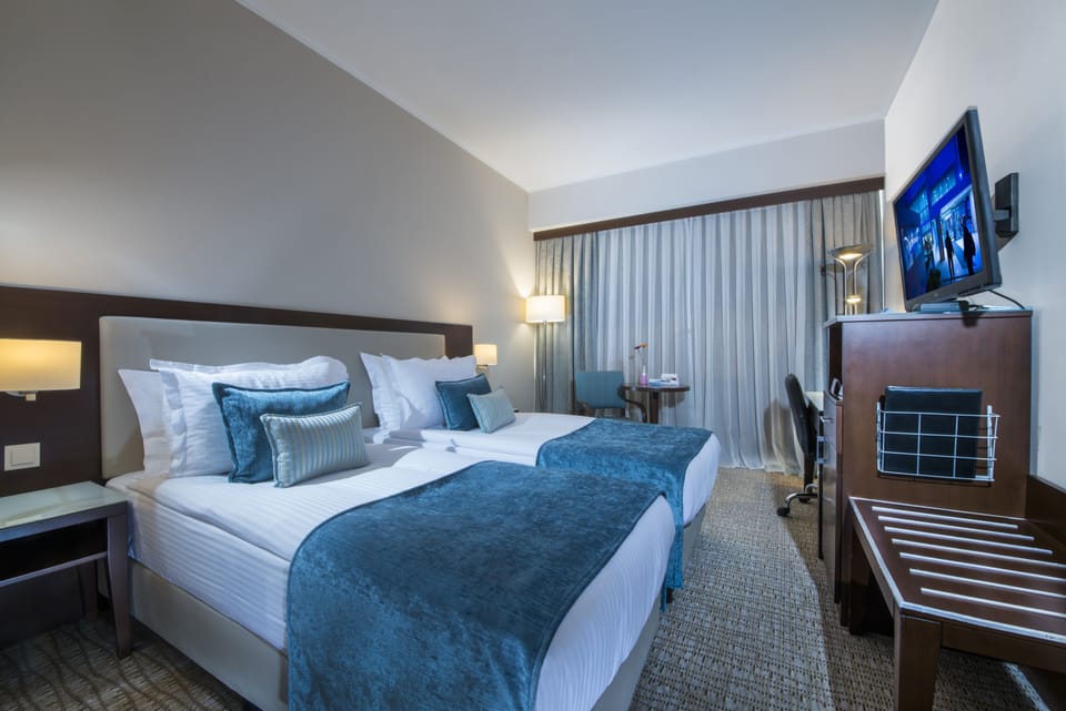 Superior Room, Balcony, City View | Down comforters, minibar, in-room safe, iron/ironing board