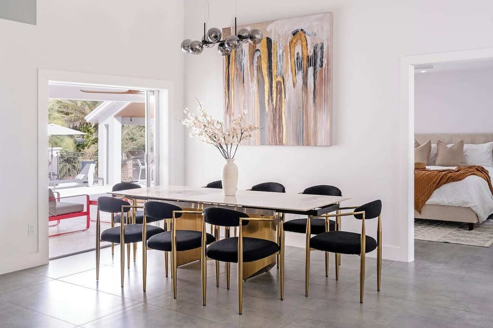 Set the table for long, easy meals.
This dining space seats up to 10, with an extra outdoor table ready to join.
Enjoy meals overlooking the pool and garden, where conversations linger and the outdoors becomes part of the moment.