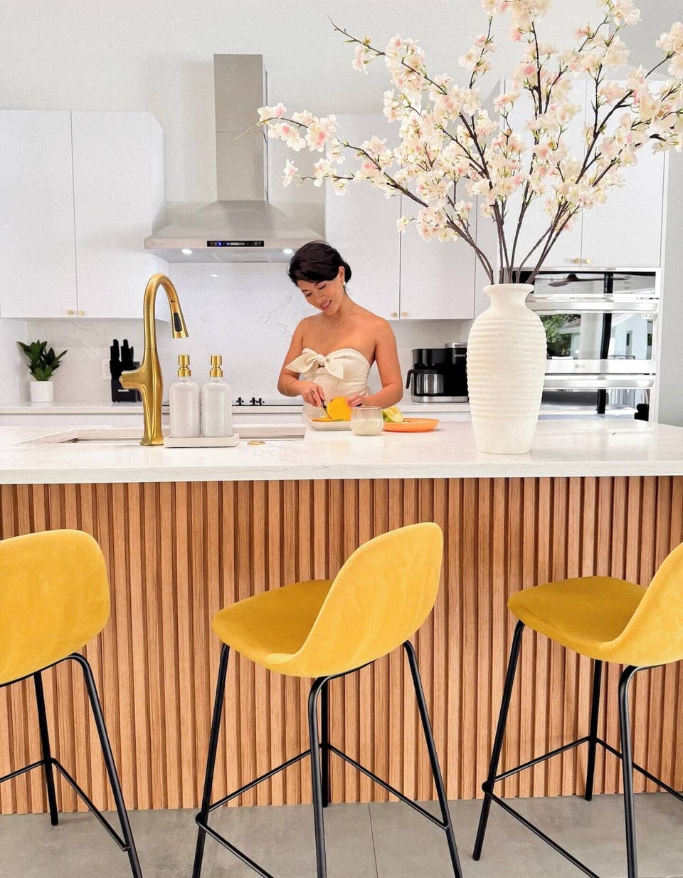 Fully stocked contemporary kitchen with a six-burner electric cooktop.
Pull up to the island to chat, sip, or snack while cooking—it’s where meals and memories happen!