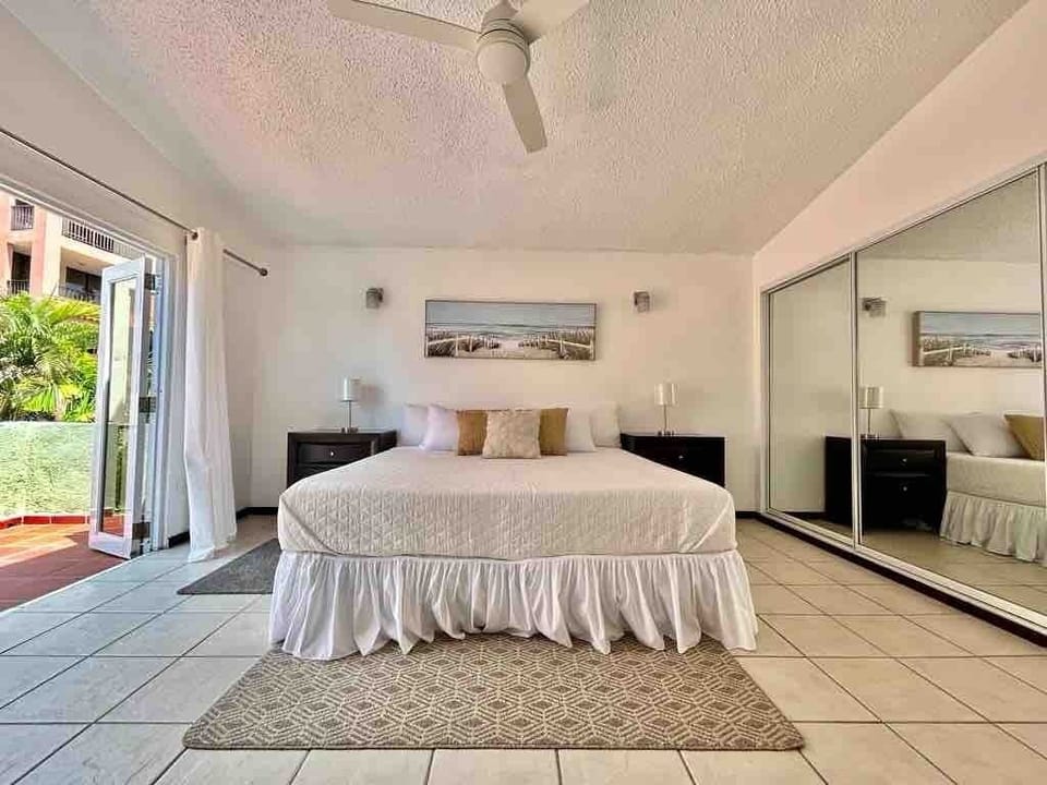 The king-size bed, with its spacious dimensions and luxurious design, exudes a sense of calm and tranquility that envelops the entire room.