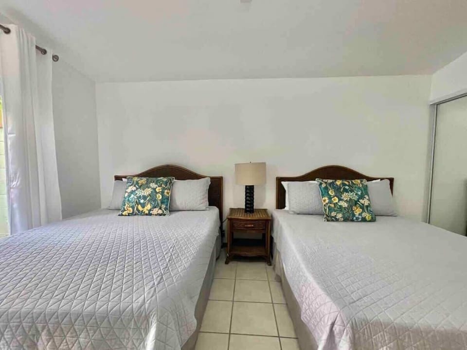 The two-bed bedroom is beautifully designed, featuring a harmonious blend of modern aesthetics and cozy comfort.