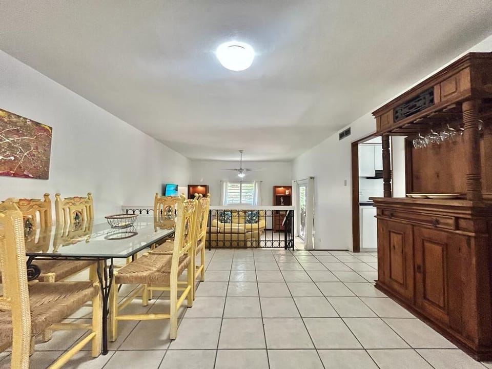 The room is adorned in vibrant colors, creating a warm and inviting atmosphere that instantly makes you feel at home.