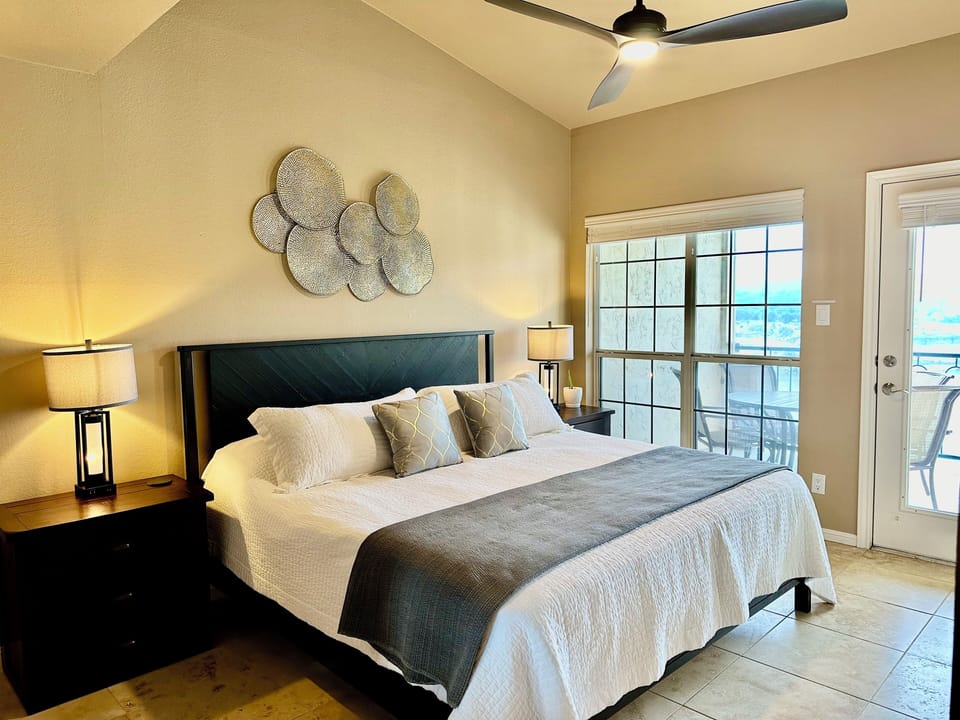 Deep Water Views and Patio Access From Master Bedroom


