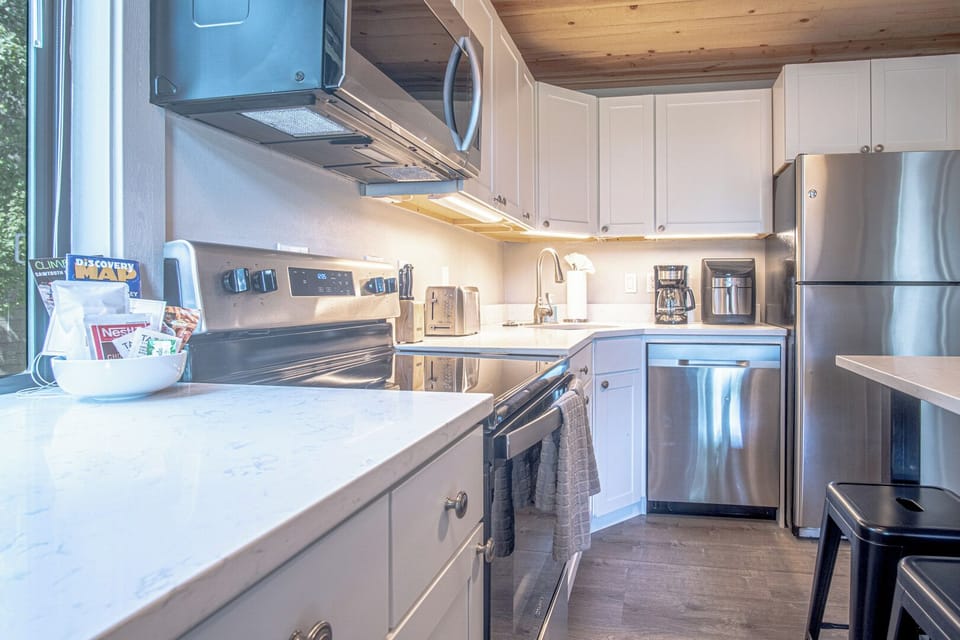 Fully equipped kitchen with stainless appliances