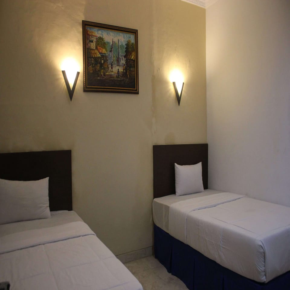 Deluxe Room, 2 Bedrooms | Desk, soundproofing, free WiFi, bed sheets