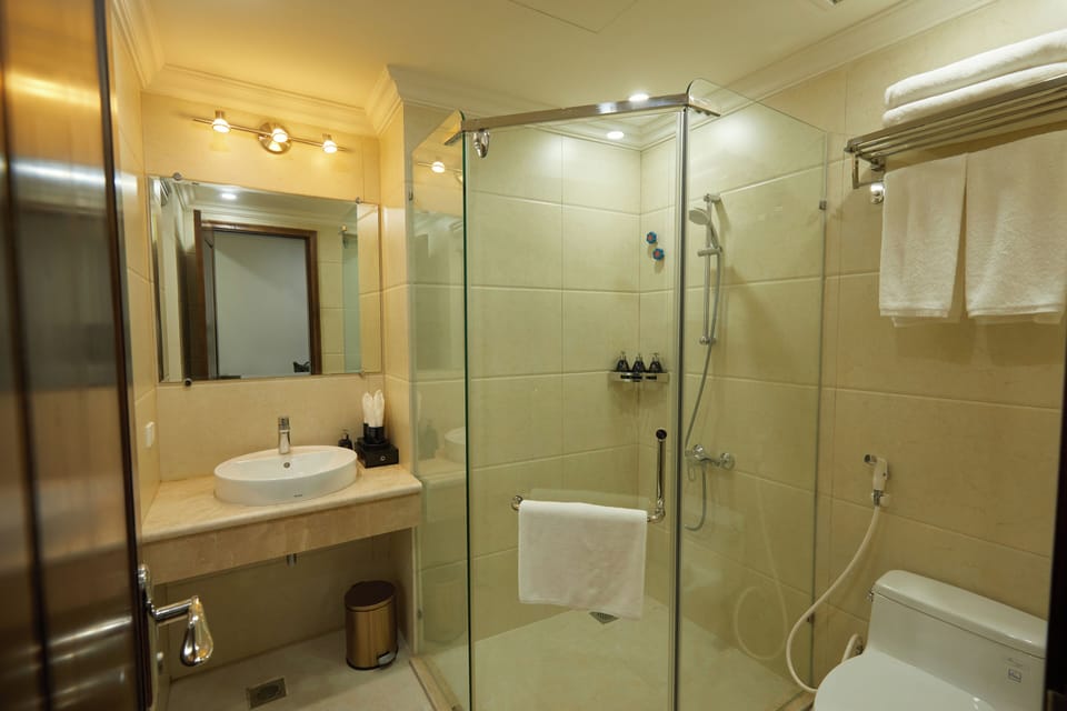 Shower, hair dryer, bathrobes, slippers