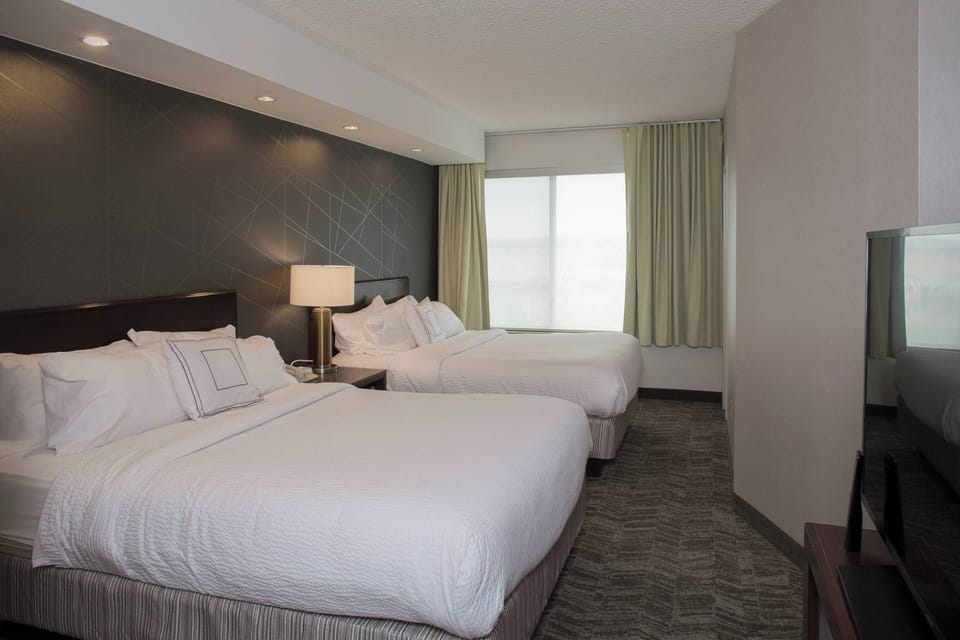 Pillowtop beds, in-room safe, desk, iron/ironing board