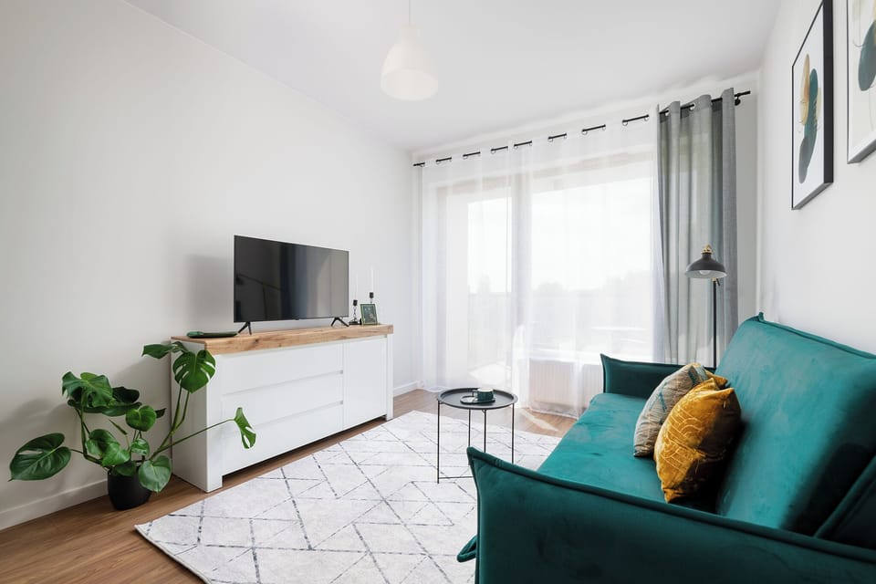 Classic Apartment, Balcony | Living room | Flat-screen TV